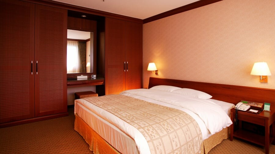 Bugging devices totally not hidden in the bed lamps, sir.