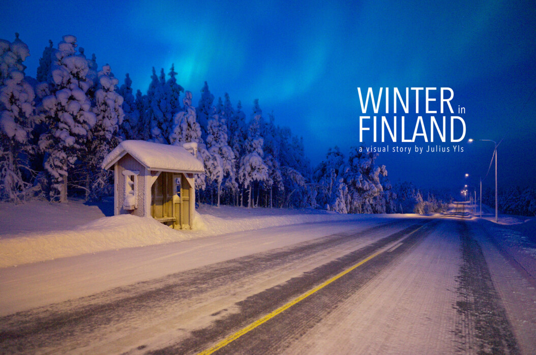 An empty winter road with northern light in Finland