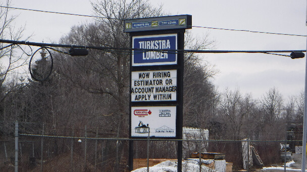 Turkstra Lumber 'Now Hiring' Sign