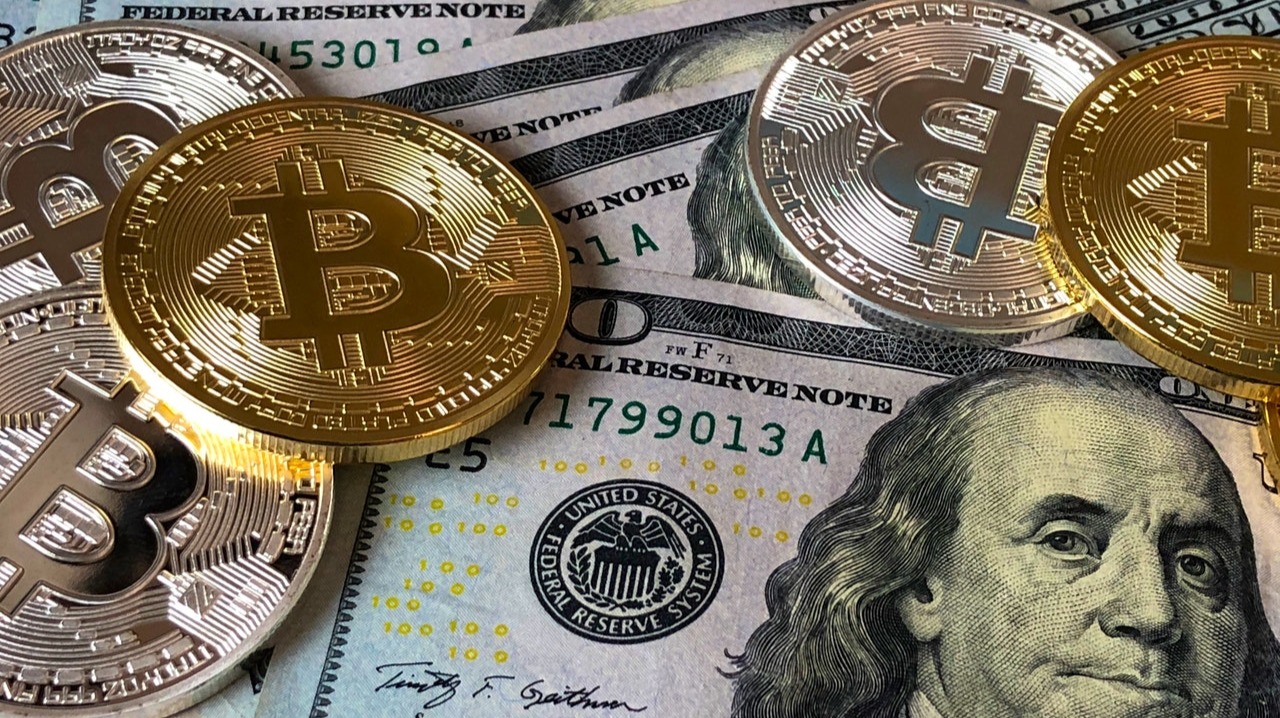 Bitcoins and us dollar bills