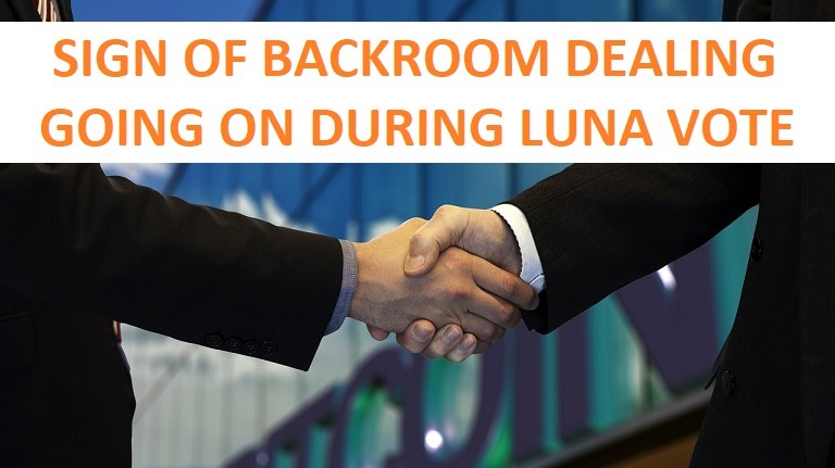 Handshake, text saying sign of backroom dealing going on during LUNA vote