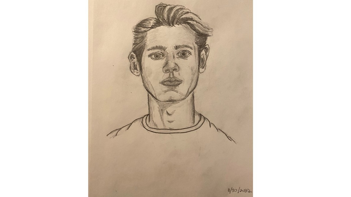 Handsome young man, bust in graphite pencil
