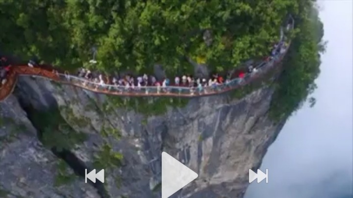 The greatest tourist-place is Tianmen mountain of Chaina.