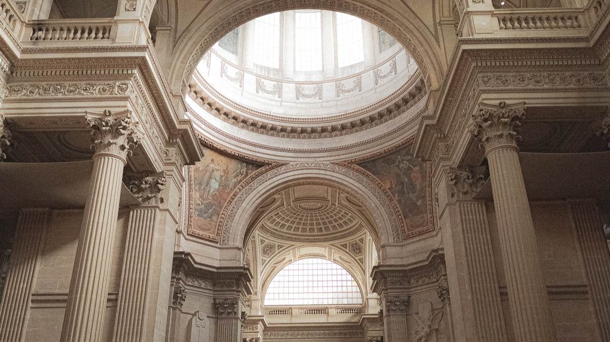Photo by Clement percheron: https://www.pexels.com/photo/ornamental-ceiling-with-doom-in-pantheon-5838681/