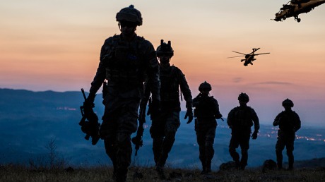 picture of military's men walking next too one another