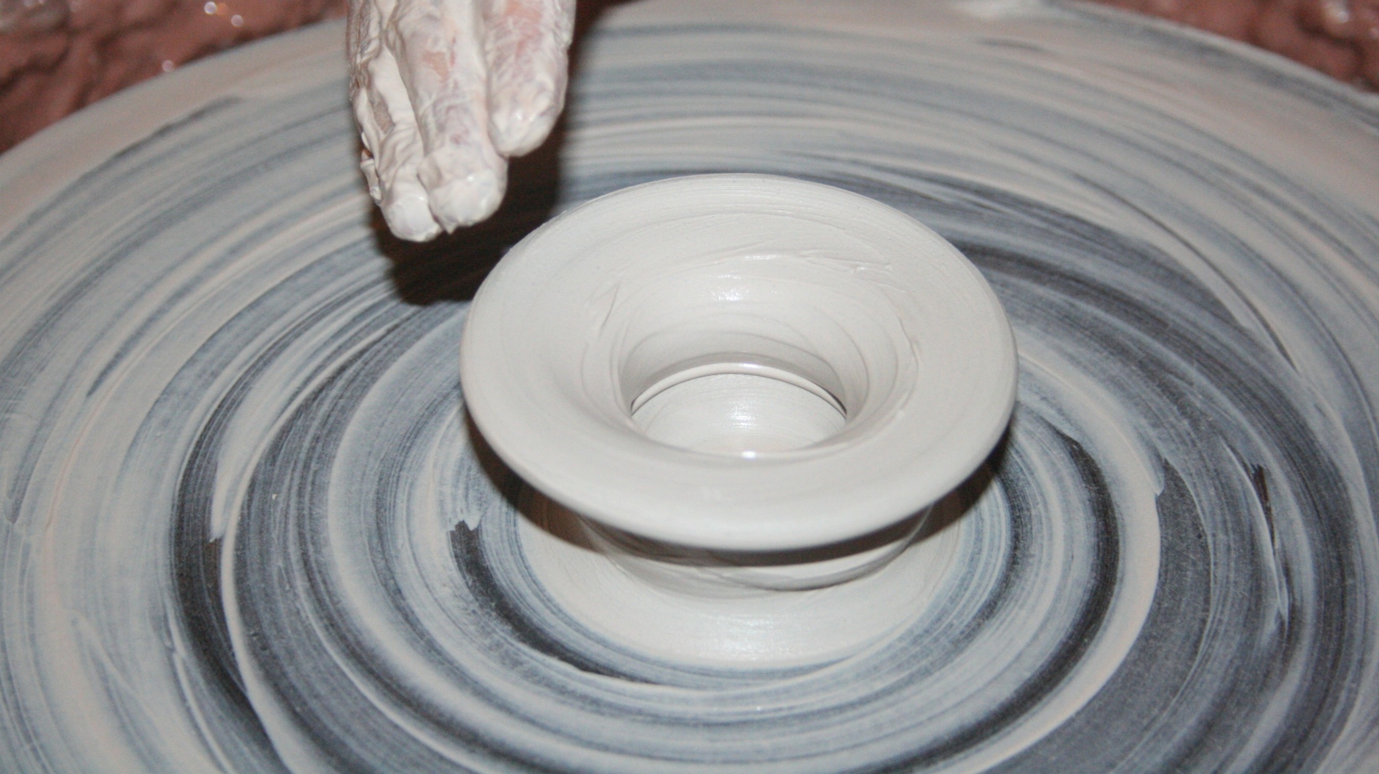 https://www.pexels.com/photo/person-making-clay-pot-162574/