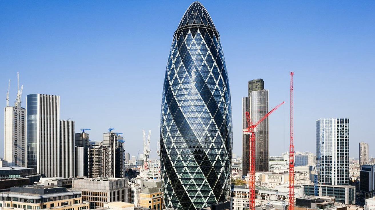 The Gherkin, London, surrounded by skyscrapers