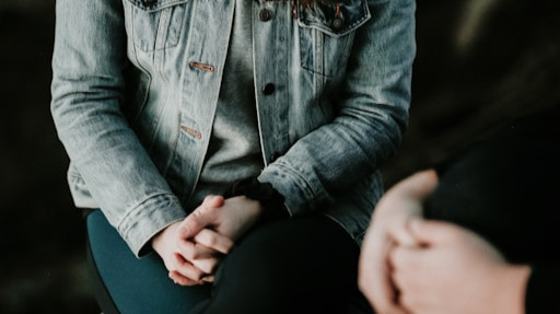 two people in a therapy session
