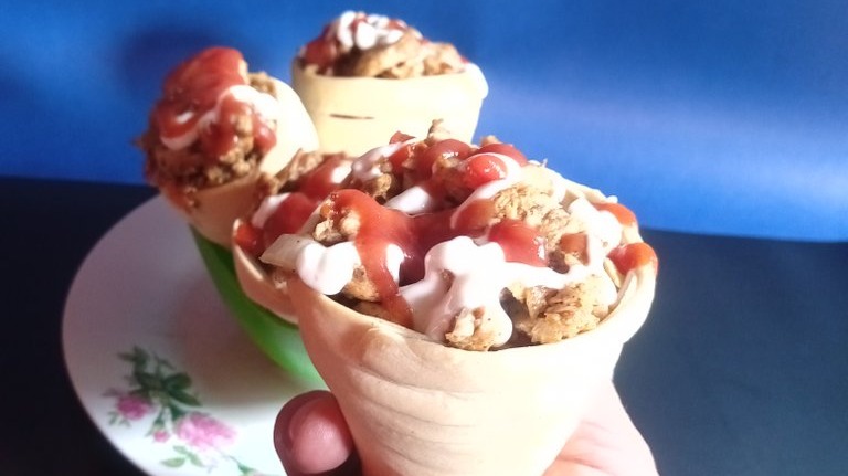 Cones with chicken and salad.   