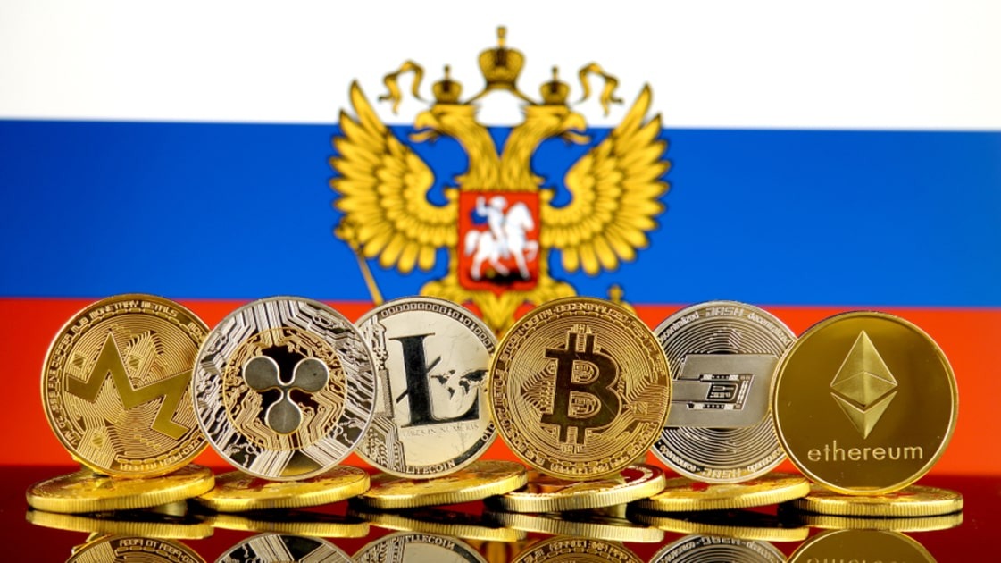 Cryptos in front of Russian flag