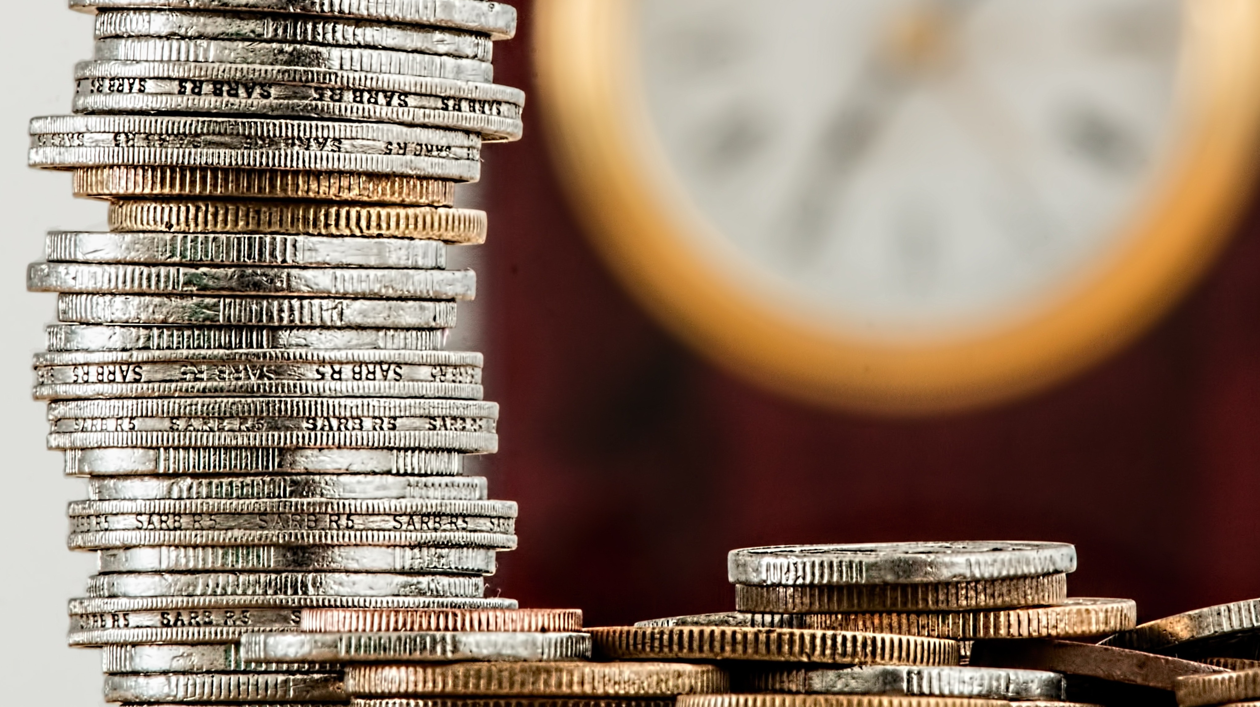 Two piles of coins with different heights