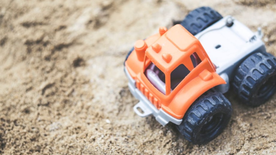 A toy in a sandbox