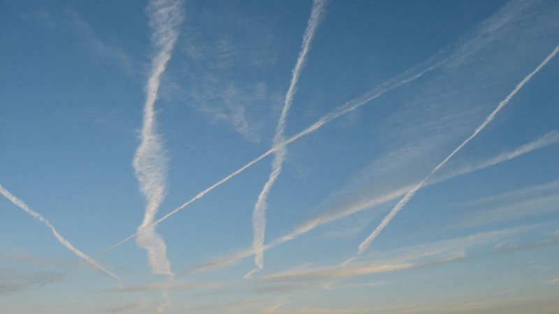 Photo of contrails, copyright Susan Gallagher