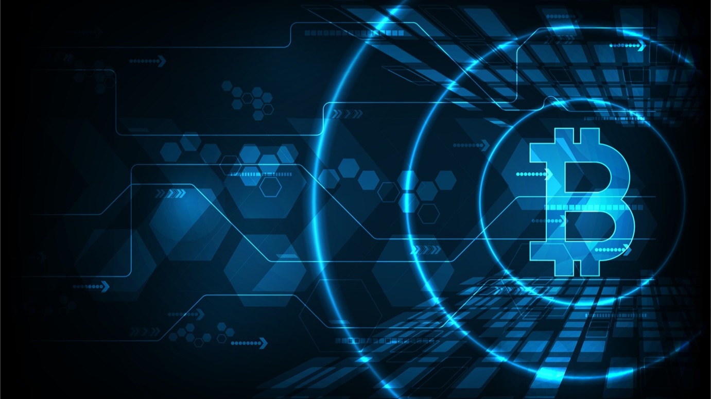 An image of bitcoin outlined in neon blue floating in a digital space
