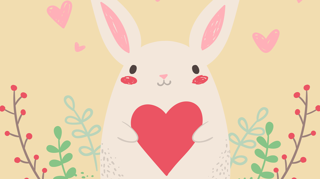 free use image from Pixabay of a bunny holding a valentine heart