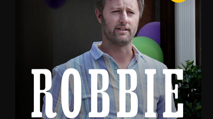 Rory Scovel as Robbie