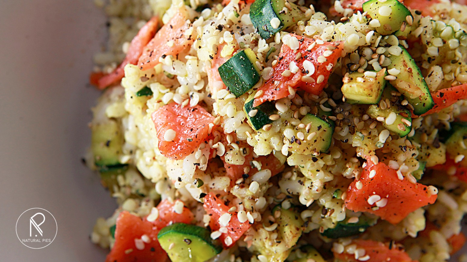 Rice, millet and buckwheat with salmon and zucchini, healthy quick tasty single dish.