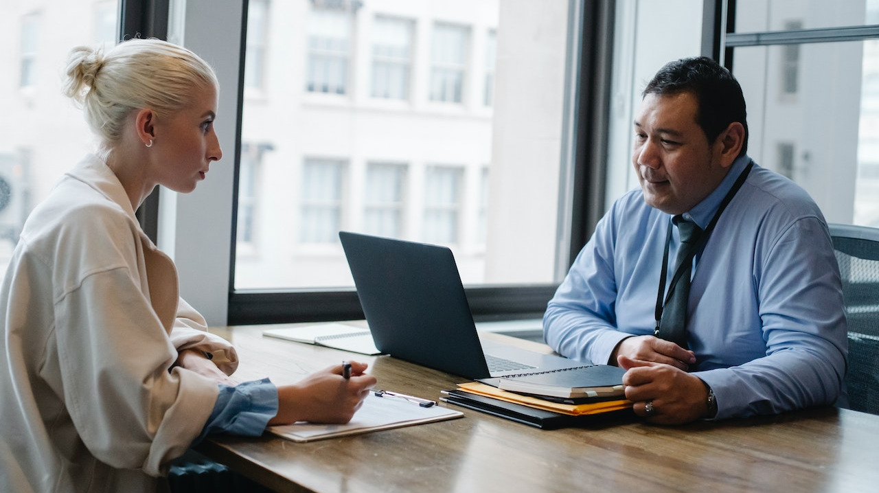 Professional man interviewing an applicant