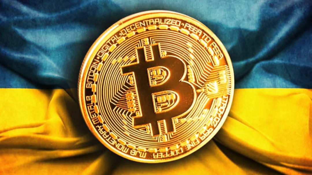 The combination of Ukrainian flag and Bitcoin representing the Crypto donations to support Ukraine