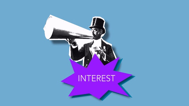 Man in a top hat screaming into a loudspeaker
