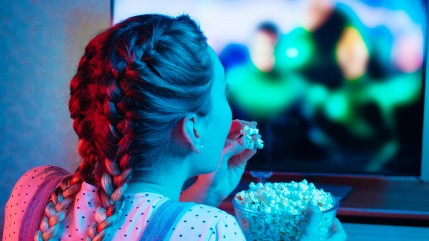 Person In Front of a TV Screen